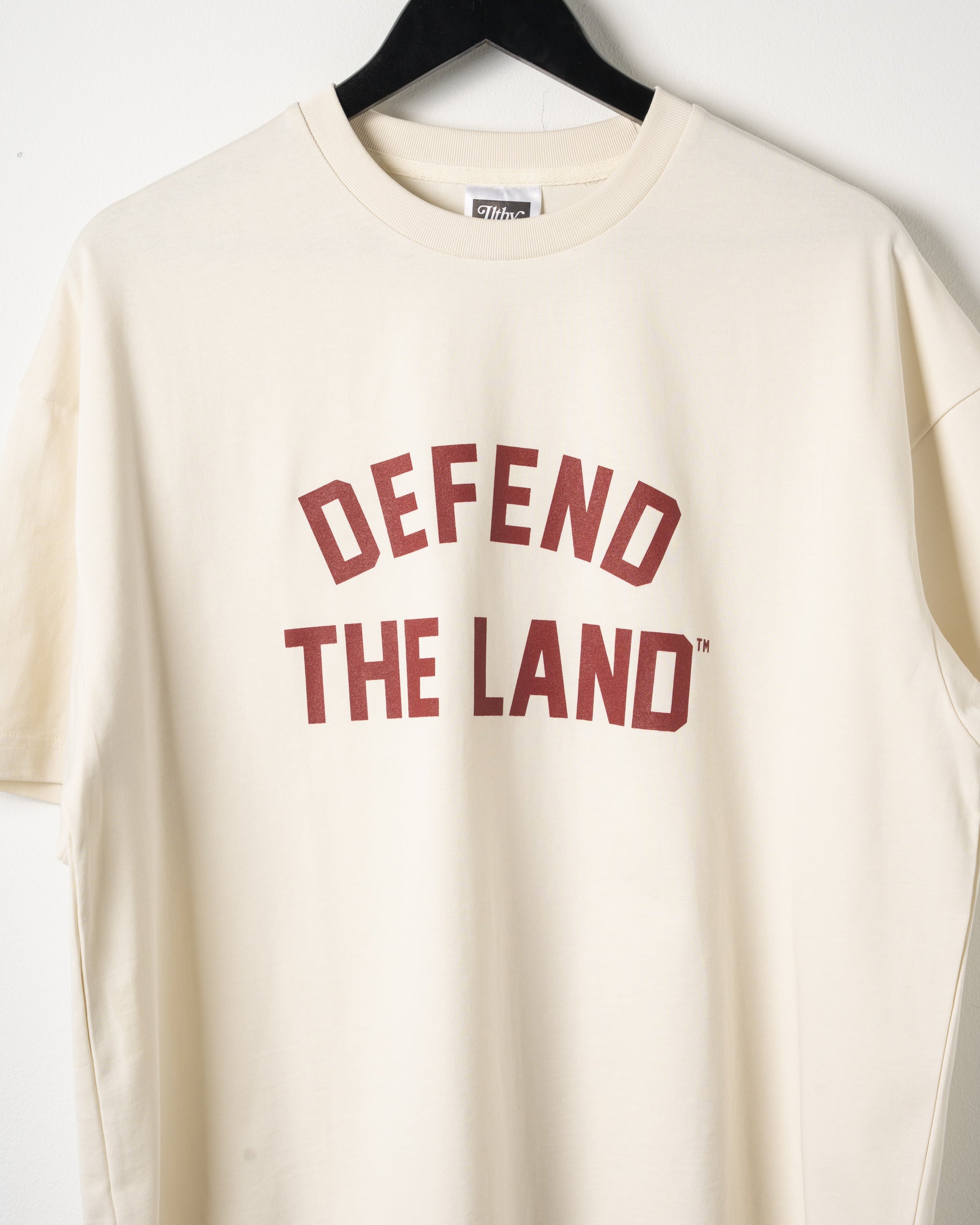 Defend the Land™ Cream Tee (Maroon)